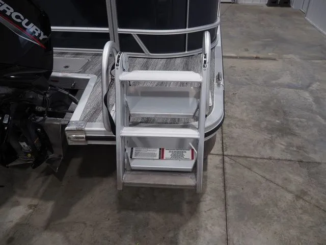 Slide: The Image of 2025 Bennington S Quad Bench 21 SSR boat ladder detail. - 6