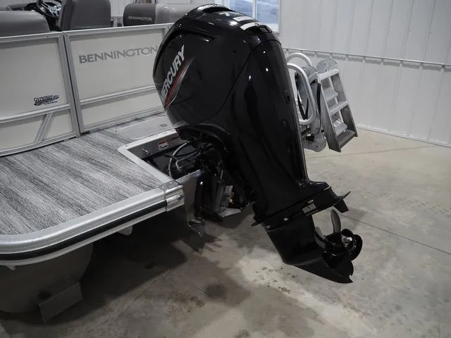 Slide: The Image of Bennington S Quad Bench 21 SSR with Mercury outboard motor, 2025 model. - 15