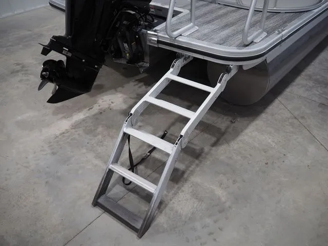 Slide: The Image of Bennington S Quad Bench 21 SSR 2025 with retractable swim ladder. - 16