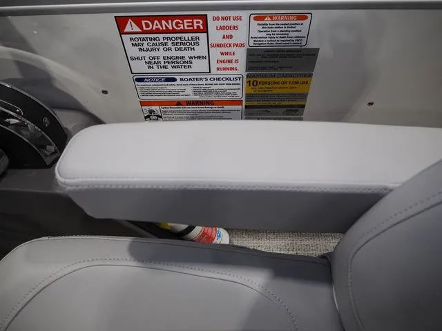 Slide: The Image of Safety warnings on Bennington S Quad Bench 21 SSR 2025 boat. - 7