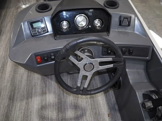 Slide: The Image of Dashboard of the 2025 Bennington S Quad Bench 21 SSR. - 10