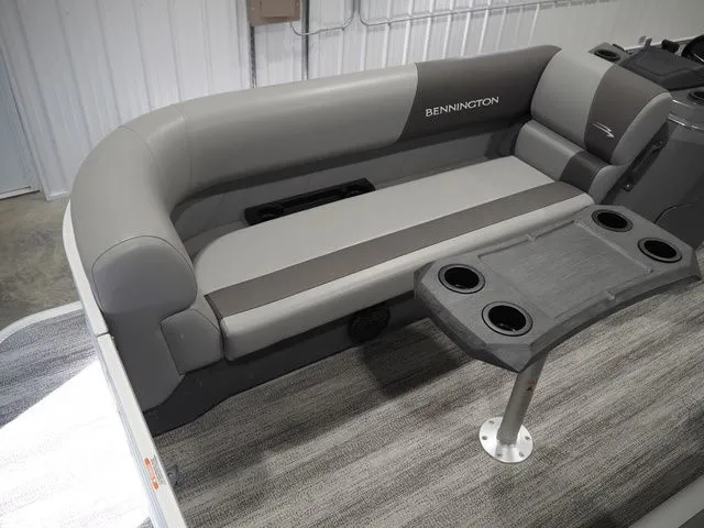 Slide: The Image of Interior of 2025 Bennington S Quad Bench 21 SSR with gray seating area. - 7