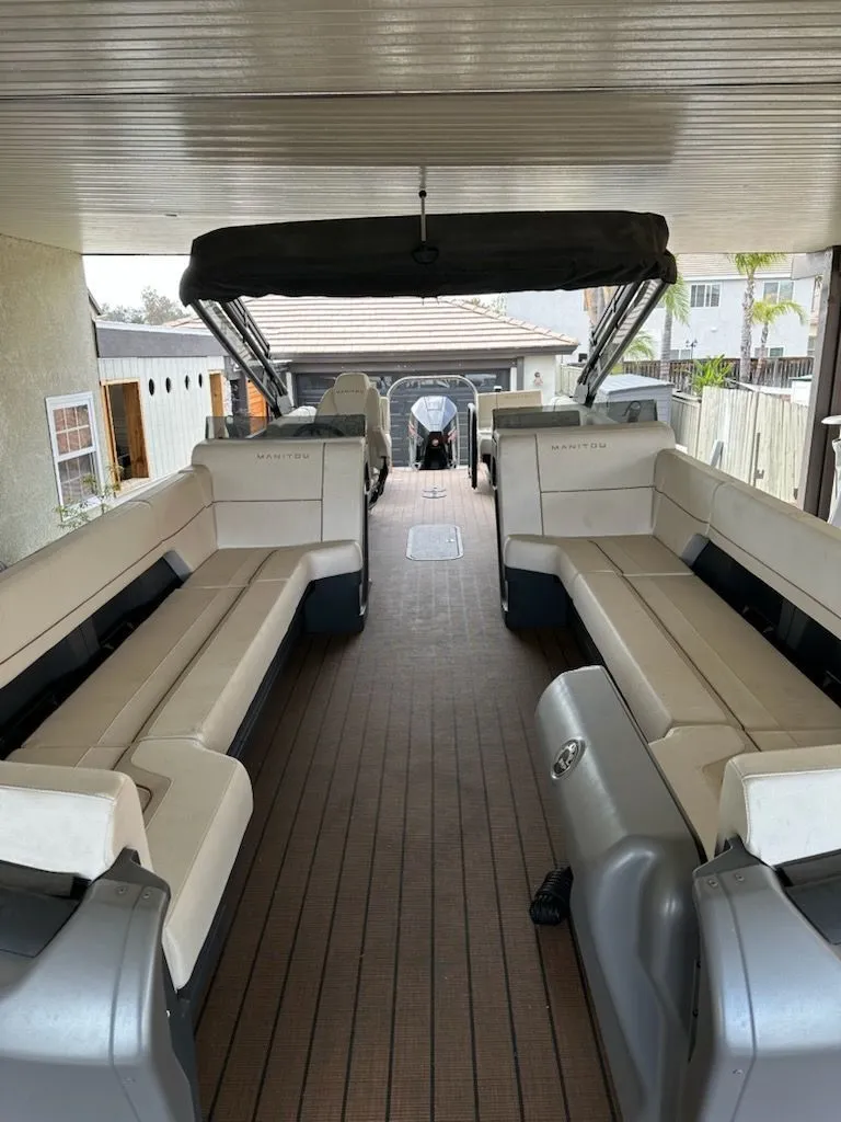 The Image of Interior view of a 2024 Manitou Switchback pontoon boat. - 0