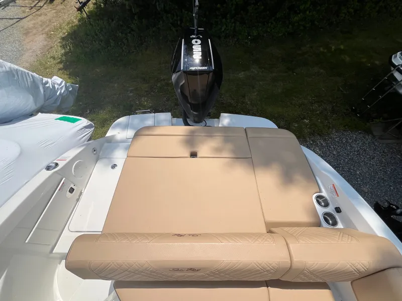 Slide: The Image of 2026 Sea Ray SDX 250 Outboard with beige upholstery. - 1
