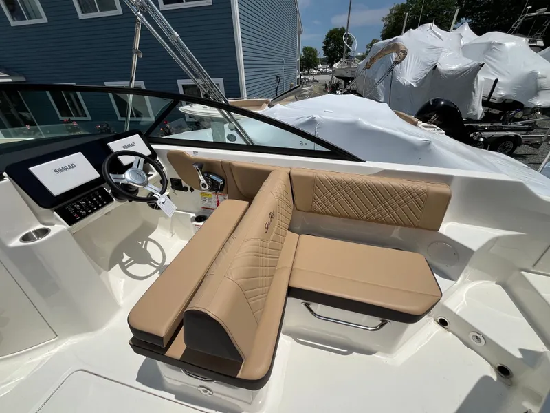 Slide: The Image of Interior of a 2026 Sea Ray SDX 250 Outboard boat. - 10