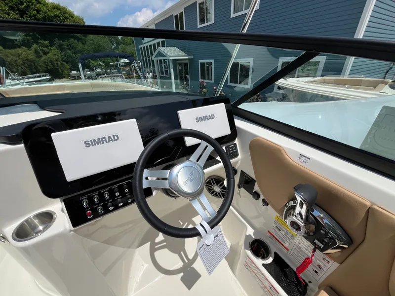 Slide: The Image of Interior view of Sea Ray SDX 250 Outboard 2026 boat. - 13