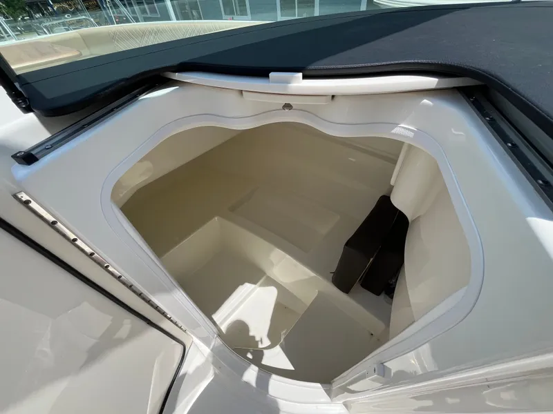 Slide: The Image of Storage compartment in 2026 Sea Ray SDX 250 Outboard boat. - 16