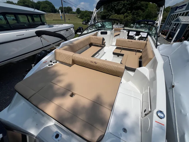 Slide: The Image of 2026 Sea Ray SDX 250 Outboard with luxurious interior design. - 2