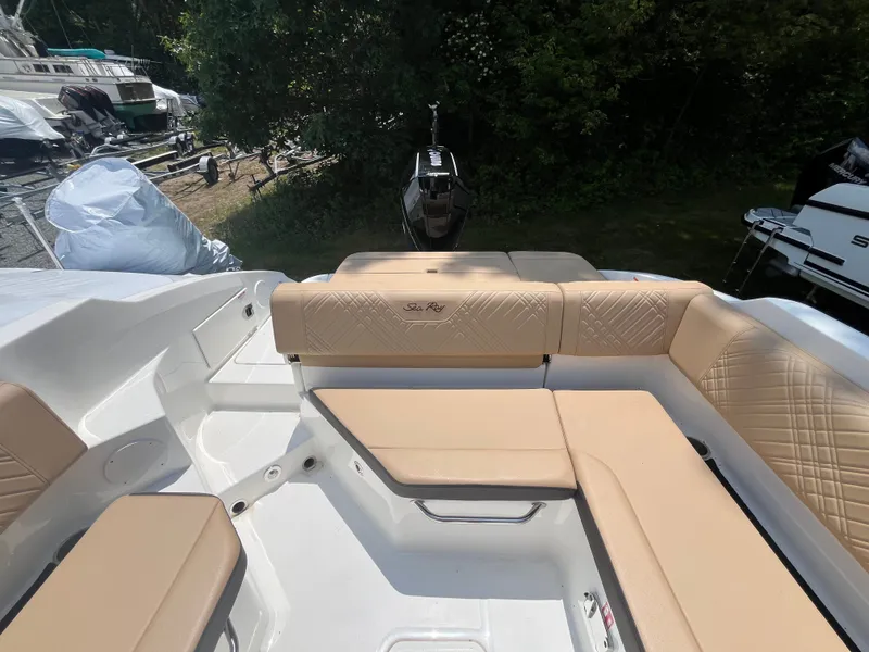 Slide: The Image of Interior of 2026 Sea Ray SDX 250 Outboard with beige seating. - 4