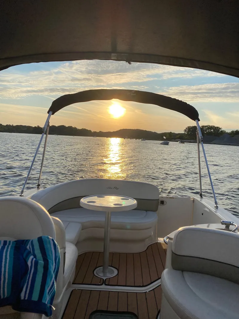 Slide: The Image of 2005 Sea Ray Sundancer 260 at sunset on the water. - 11