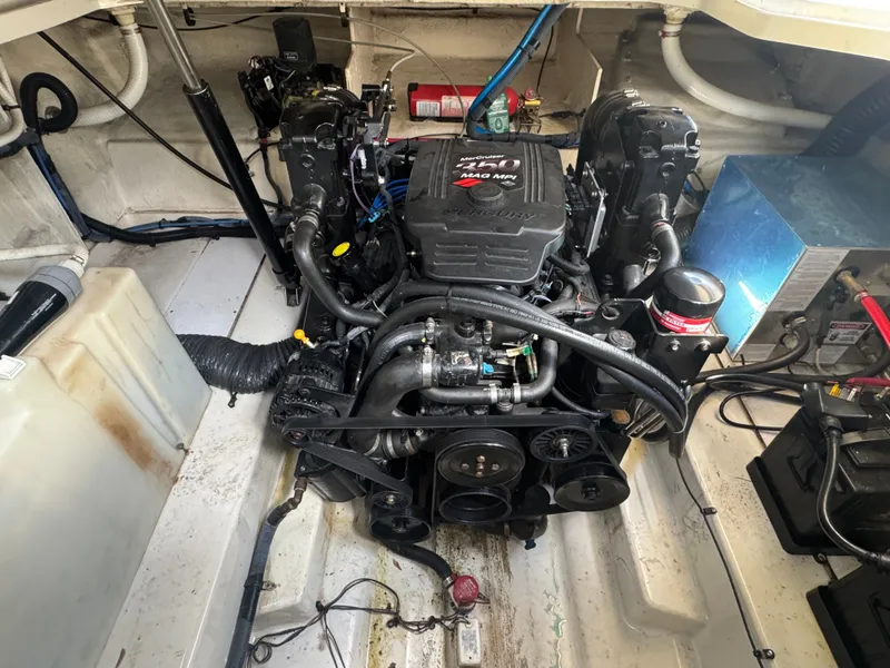 Slide: The Image of Engine compartment of a 2005 Sea Ray Sundancer 260 boat. - 19