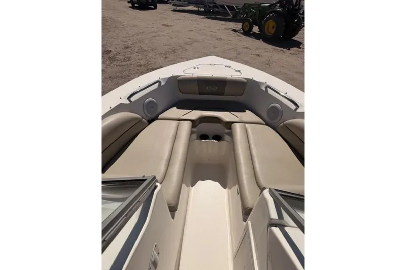Slide: The Image of 2021 Key West 203 DFS boat interior with beige seating and cup holders. - 5