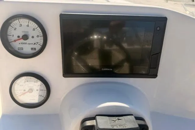 Slide: The Image of Dashboard of 2021 Key West 203 DFS boat with Garmin display and gauges. - 6