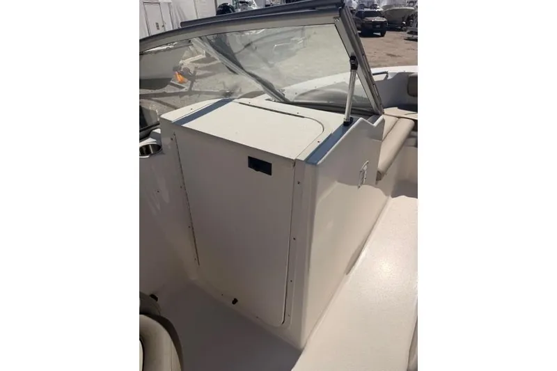 Slide: The Image of 2021 Key West 203 DFS boat interior with windshield and seating area. - 8