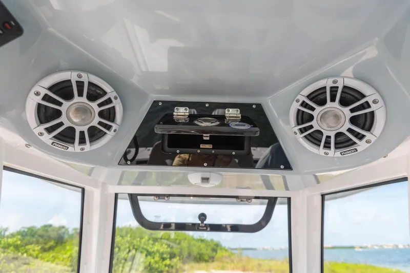 Slide: The Image of Interior view of 2026 Sportsman Open 262 Center Console with Fusion speakers. - 5