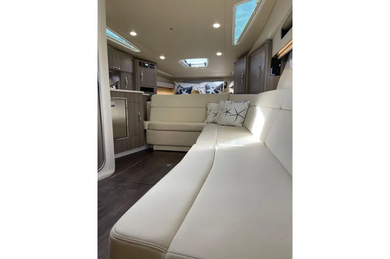 Slide: The Image of Luxurious interior of 2012 Regal 35 Sport Coupe with plush seating and modern design. - 34
