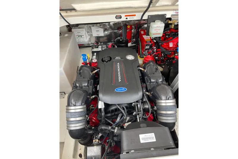 Slide: The Image of Engine compartment of a 2012 Regal 35 Sport Coupe, featuring a Volvo Penta engine. - 53