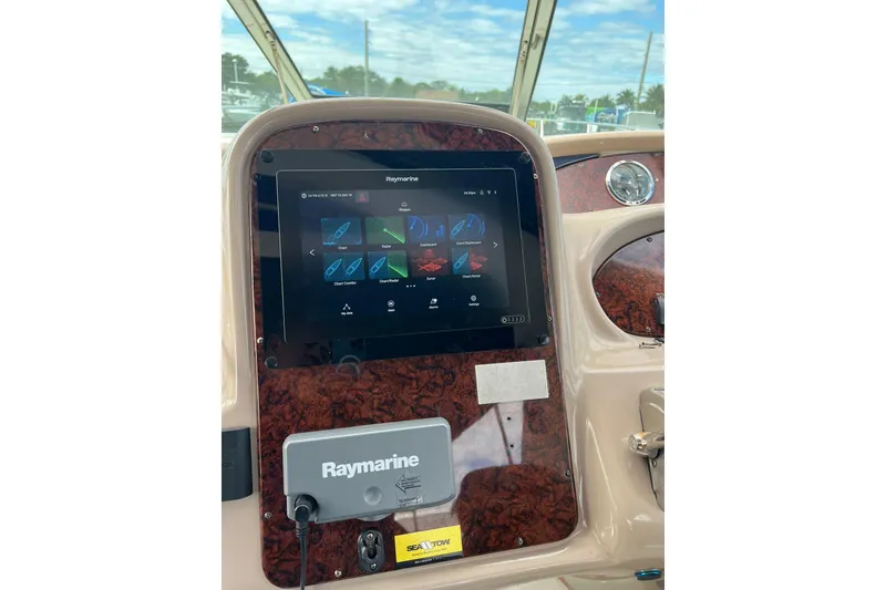 Slide: The Image of Control panel of a 2004 Sea Ray 380 Sundancer with Raymarine navigation system. - 16