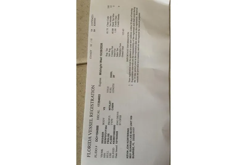 Slide: The Image of Florida vessel registration document for a 2004 Sea Ray 380 Sundancer boat. - 24