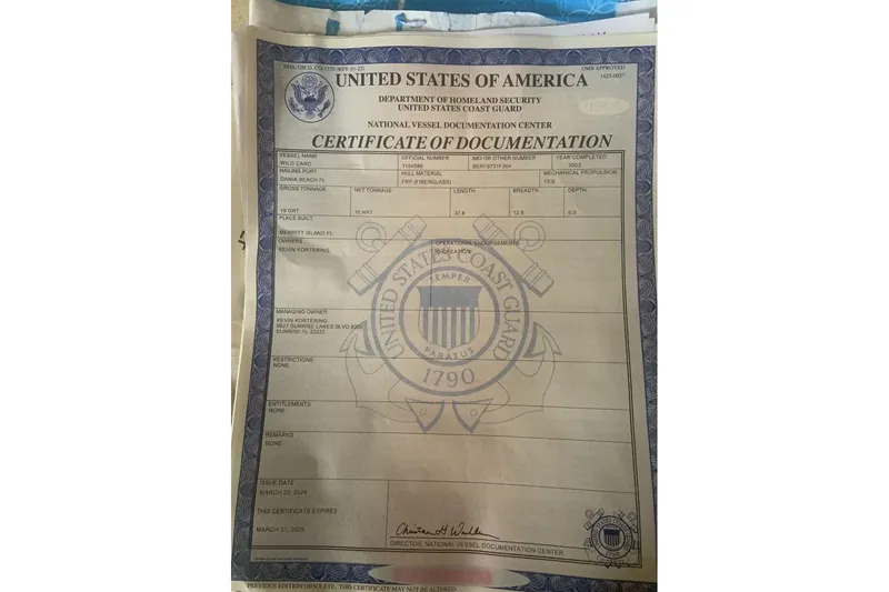 Slide: The Image of United States Coast Guard Certificate for 2004 Sea Ray 380 Sundancer vessel documentation. - 25