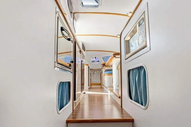 Slide: The Image of Interior view of 2002 Outremer 55 Light catamaran, featuring sleek design and modern amenities. - 25