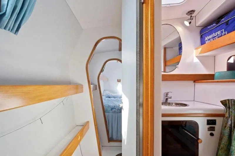 Slide: The Image of Interior of 2002 Outremer 55 Light yacht with cozy cabin and compact kitchenette. - 28