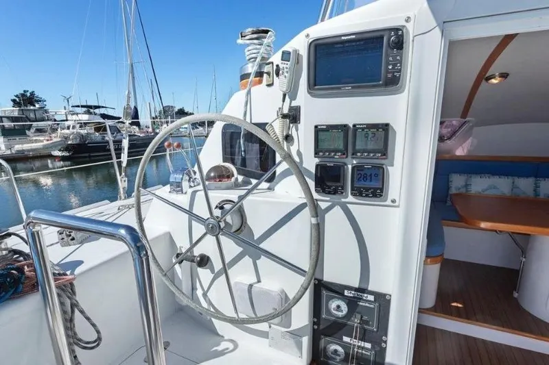 Slide: The Image of Cockpit of 2002 Outremer 55 Light yacht with navigation instruments and steering wheel. - 8