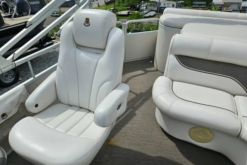 Slide: The Image of Luxury seating on 2007 Premier 225 Legend RE boat, featuring white leather upholstery. - 7