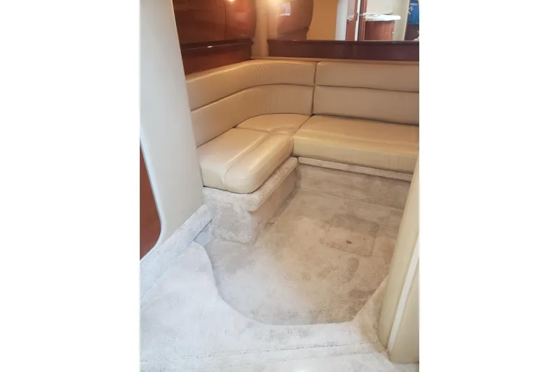 Slide: The Image of Interior of 2003 Sea Ray 420 Sundancer with beige sofa. - 20