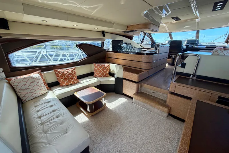 Slide: The Image of Luxurious interior of a 2013 Azimut 60 yacht with elegant seating and modern design. - 25