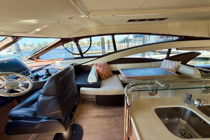 Slide: The Image of Luxurious interior of a 2013 Azimut 60 yacht with elegant seating and helm. - 30