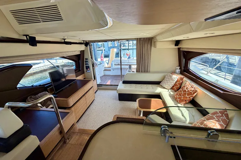 Slide: The Image of Luxurious interior of a 2013 Azimut 60 yacht with elegant seating and modern amenities. - 31