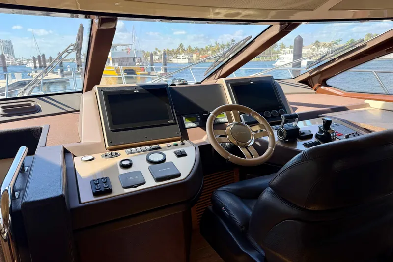 Slide: The Image of Luxurious helm of a 2013 Azimut 60 yacht with modern navigation equipment. - 33