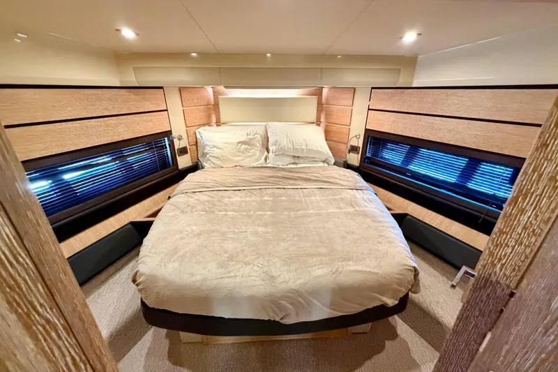 Slide: The Image of Luxurious bedroom interior of a 2013 Azimut 60 yacht with cozy bedding and modern design. - 51