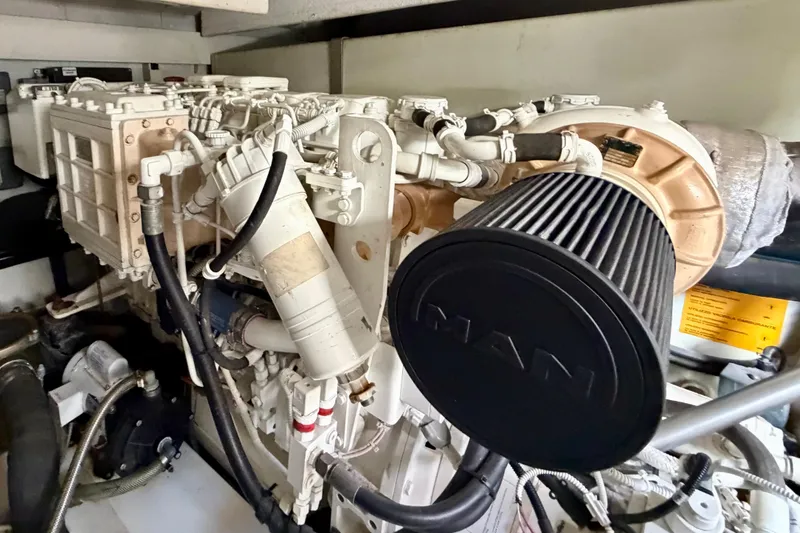 Slide: The Image of Engine room of a 2013 Azimut 60 yacht featuring a MAN engine. - 68