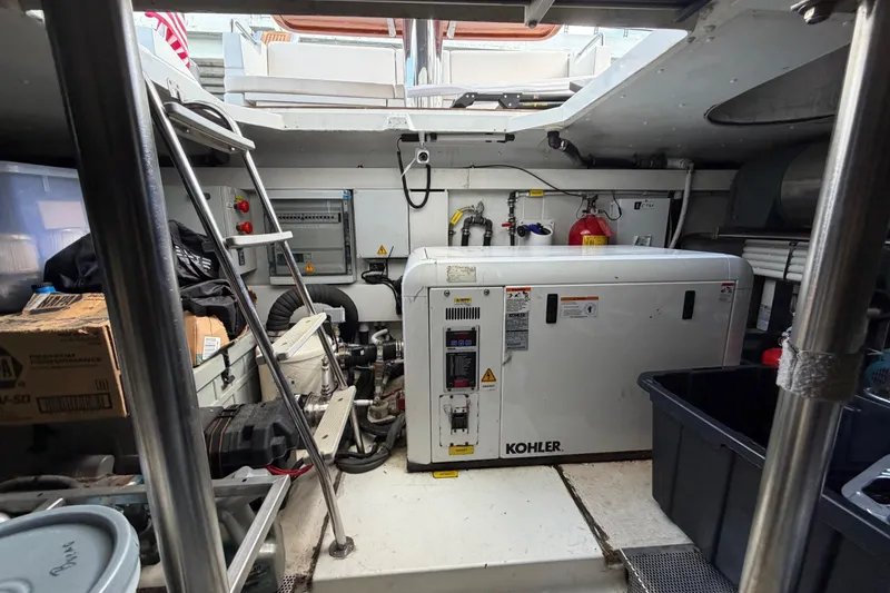 Slide: The Image of Engine room of a 2013 Azimut 60 yacht featuring a Kohler generator. - 70