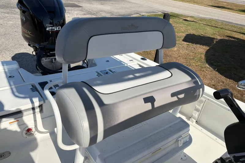 Slide: The Image of 2021 NauticStar 227 XTS boat seat and Yamaha 250 engine in sunlight. - 13