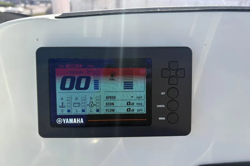Slide: The Image of Yamaha digital display on 2021 NauticStar 227 XTS boat showing speed and fuel metrics. - 17