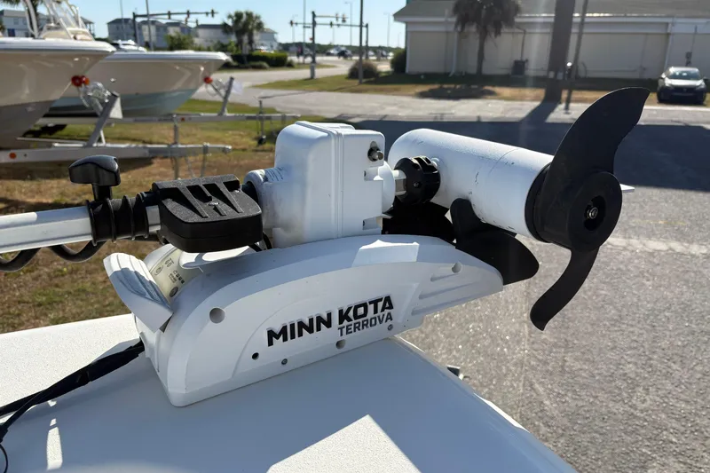 Slide: The Image of Minn Kota Terrova trolling motor on 2021 NauticStar 227 XTS boat, outdoor setting. - 30