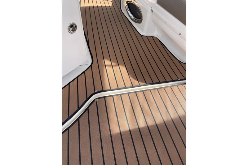 Slide: The Image of Teak-style deck flooring on 2003 Sea Ray 340 Sundancer boat. - 13