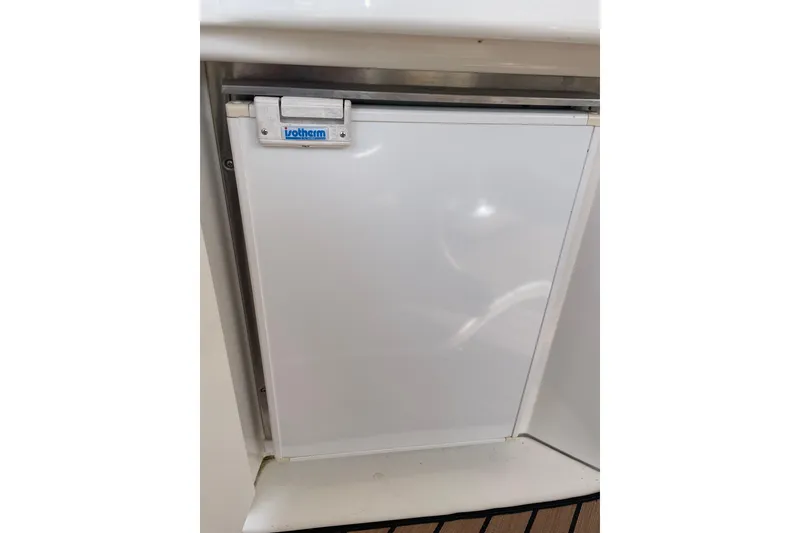 Slide: The Image of Built-in refrigerator on a 2003 Sea Ray 340 Sundancer boat. - 14