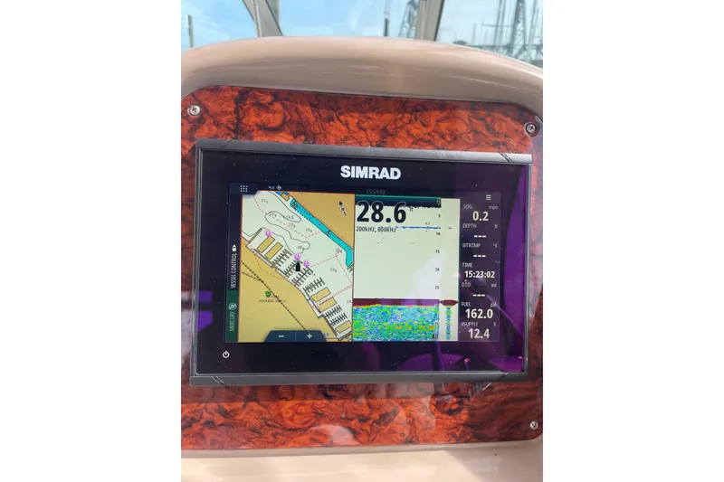 Slide: The Image of Simrad navigation display on 2003 Sea Ray 340 Sundancer boat dashboard. - 20