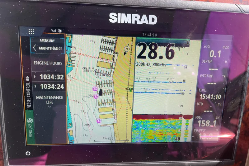 Slide: The Image of Simrad marine display showing navigation and engine data for 2003 Sea Ray 340 Sundancer. - 21