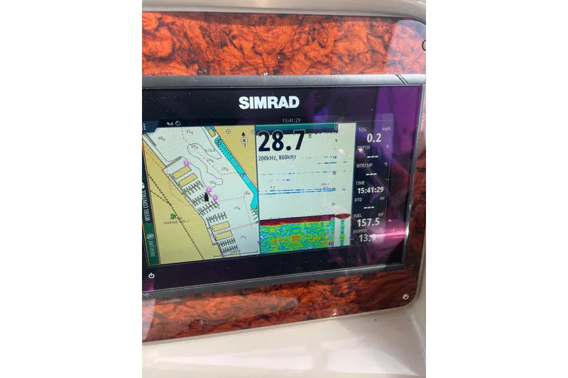 Slide: The Image of Simrad marine display on 2003 Sea Ray 340 Sundancer, showing navigation and sonar data. - 22