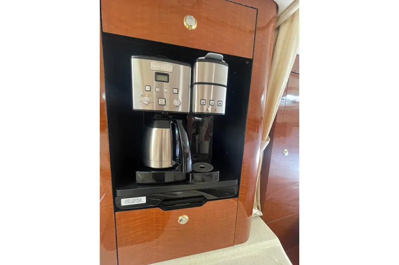 Slide: The Image of Coffee maker in 2003 Sea Ray 340 Sundancer yacht's wooden interior. - 35