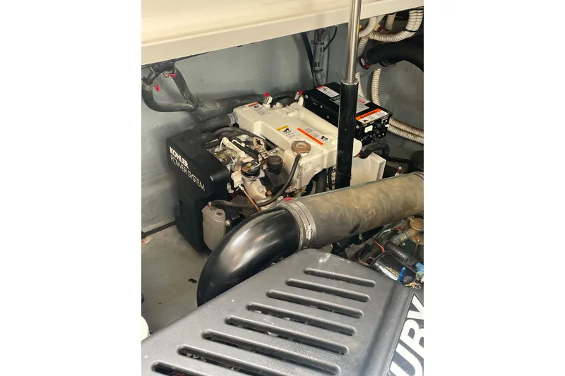 Slide: The Image of Engine compartment of a 2003 Sea Ray 340 Sundancer with Kohler power system. - 54