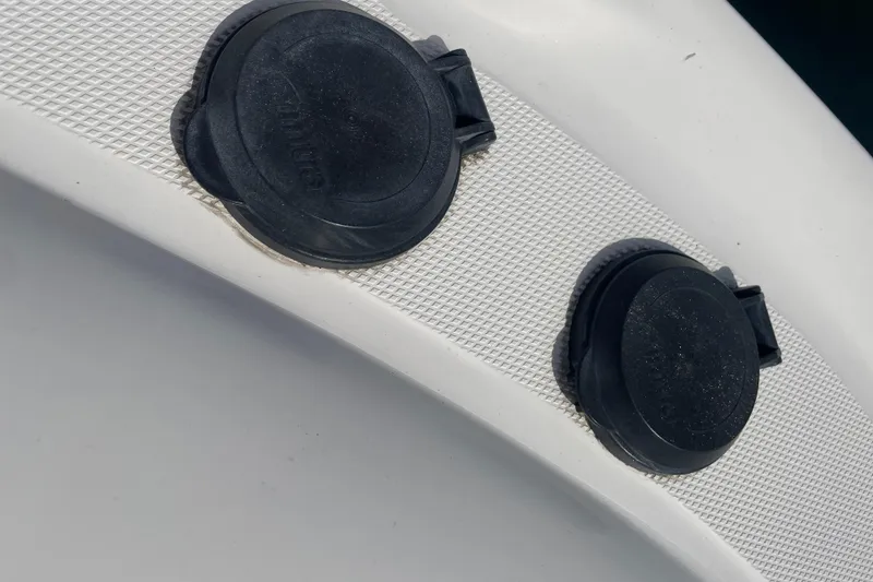 Slide: The Image of Close-up of black caps on a 2003 Sea Ray 340 Sundancer boat deck. - 7