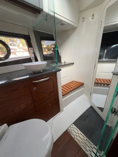 Slide: The Image of Luxurious bathroom of the 2023 Boston Whaler 405 Conquest yacht. - 2