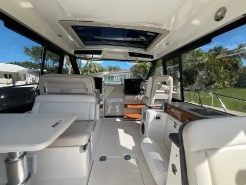 Slide: The Image of Interior of 2023 Boston Whaler 405 Conquest yacht, luxurious and modern. - 4