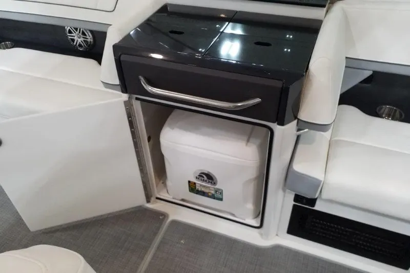Slide: The Image of Interior of 2021 Formula 330 Crossover Bowrider with storage compartment and cooler. - 12